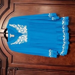 Multiples notch-neck embroidered top.